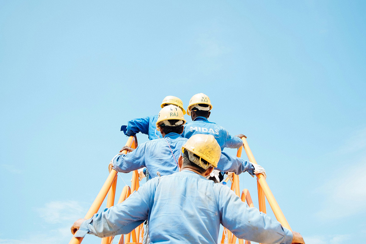 workers in a Singaporean shipyard